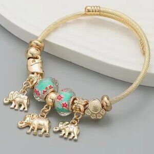 *NWOT* Titanium Steel Elephant Accent Gold Bracelet